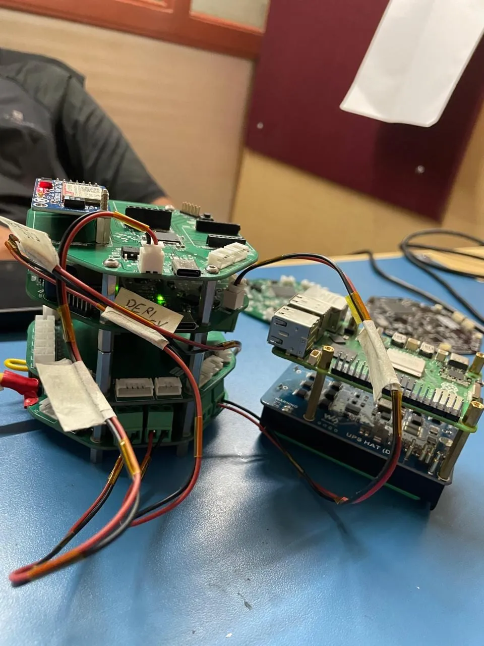 rocketry avionics under test, payload stack alongside